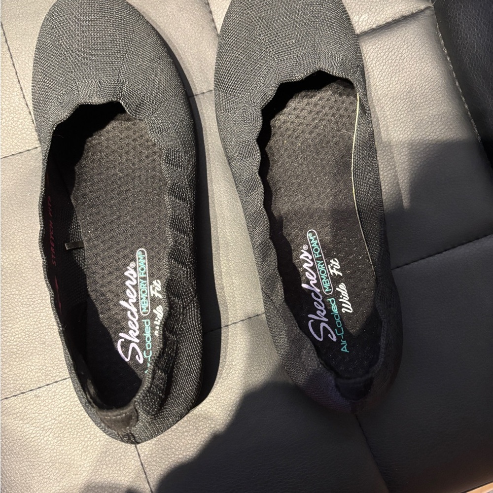 Skechers Black Air-Cooled Slip-On comfortable flats by Sketcher.